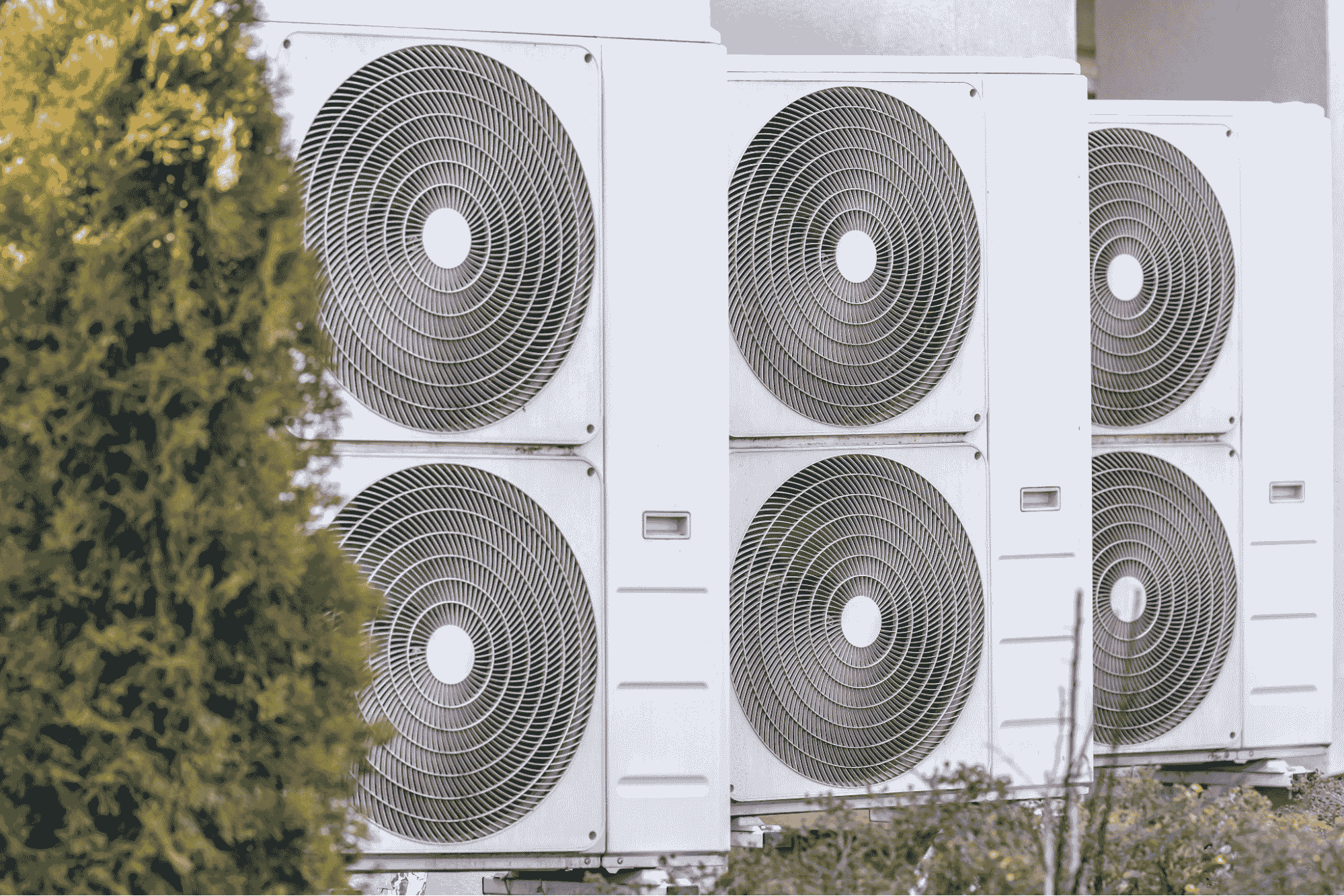 Multiple HVAC condenser units supporting heating and cooling in Macomb, MI homes