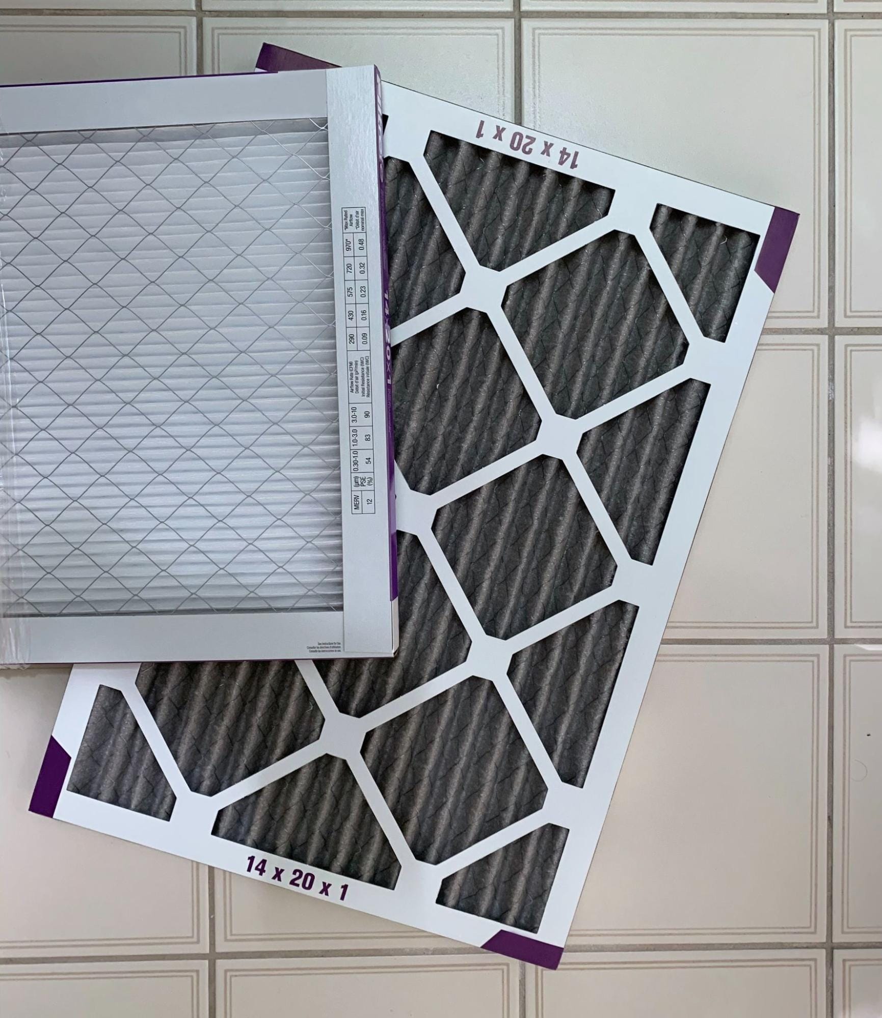 Two 14x20x1 pleated air filters with MERV 12 rating used for HVAC filter replacement in Clay Township, MI