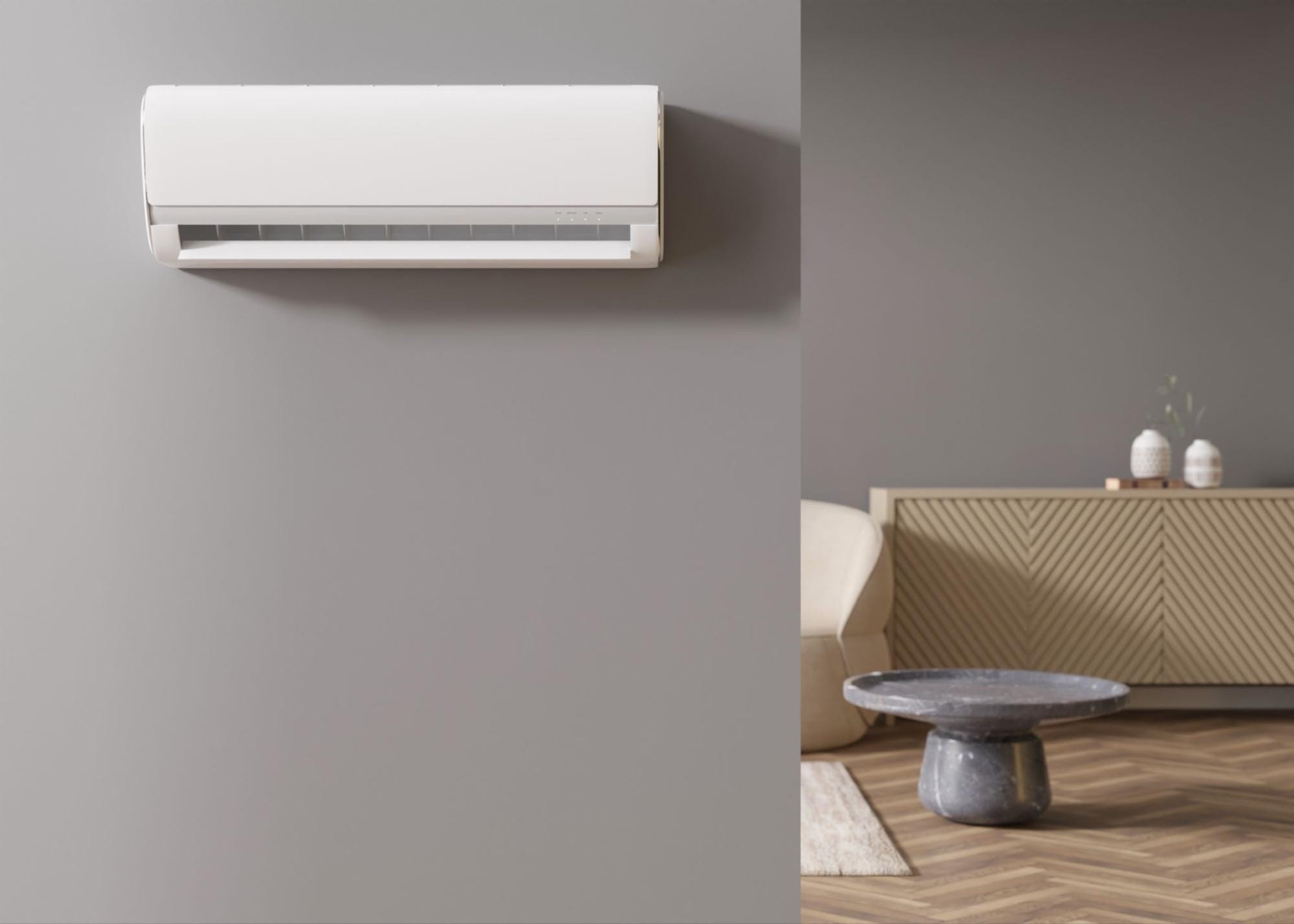 Sleek white ductless mini split indoor unit with indicator lights mounted on a gray wall above a modern living space with a stone side table and wood sideboard, representing the heating mode test homeowners should run in fall before cold weather, with ductless heat pump maintenance from S&P Heating in Clay Township, MI